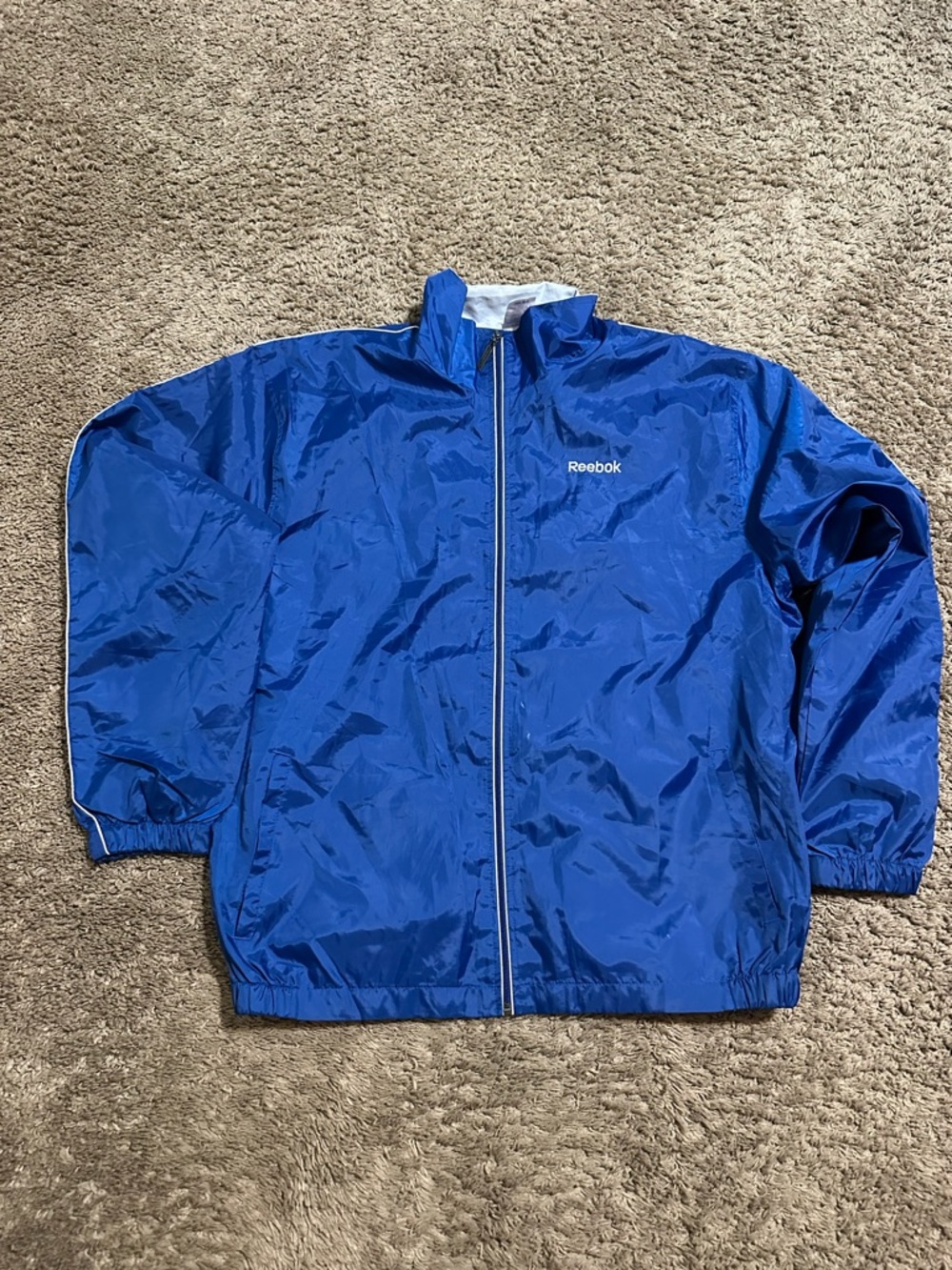 Vintage Reebok “triple blue” soccer windbreaker jacket 00s size 2XL